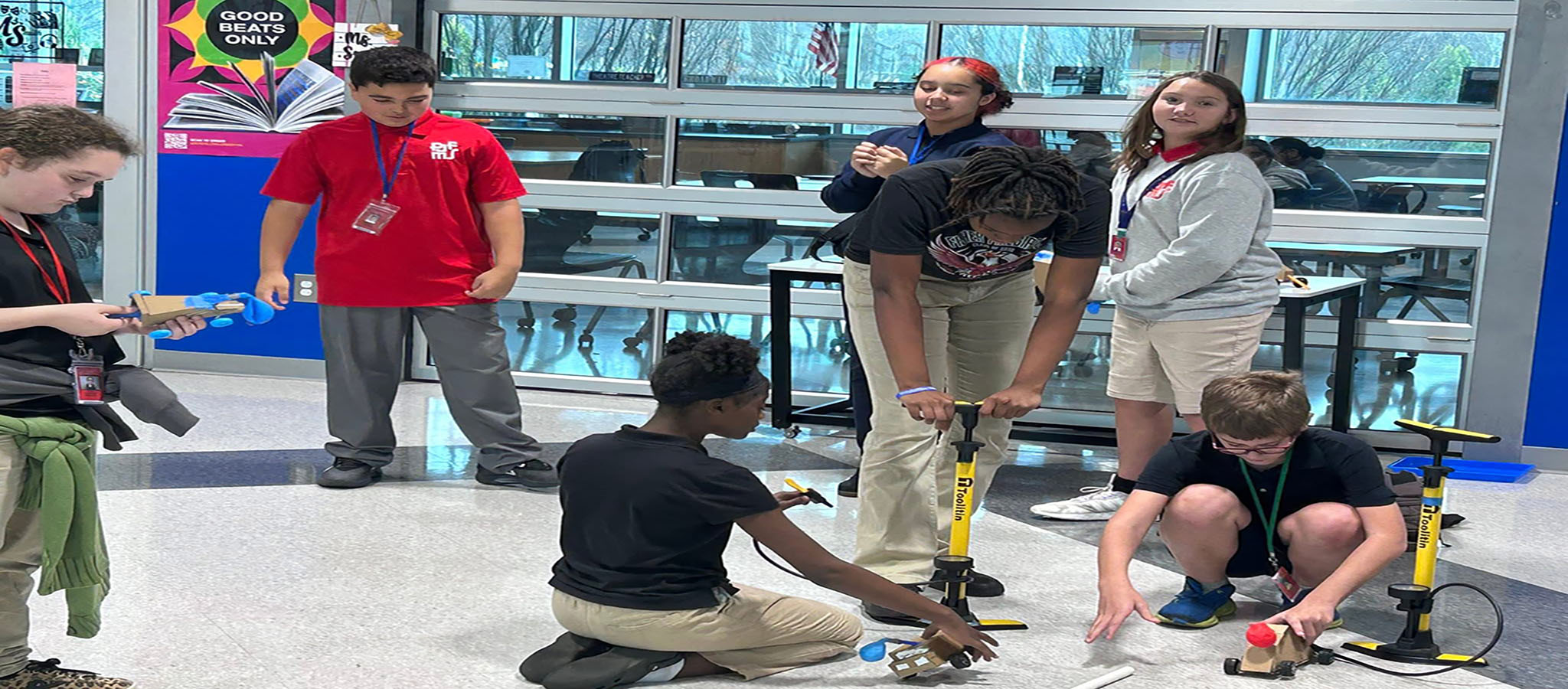 Group of FMS students using air rockets